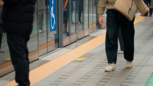 People waiting at a subway platform