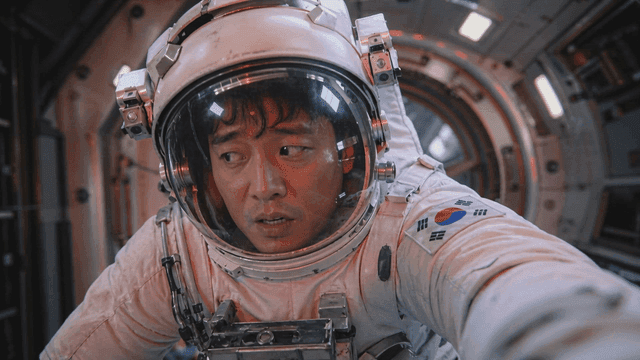 Astronaut in a spacecraft interior