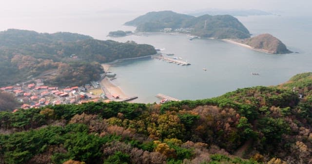 Autumn-Colored Forests and Coastal Villages