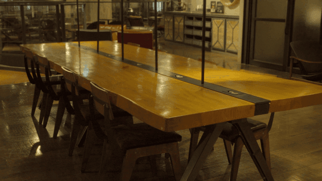 Empty cafe with wooden tables and chairs