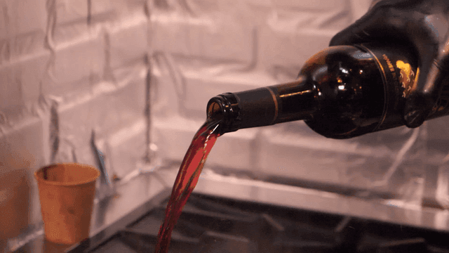 Pouring red wine