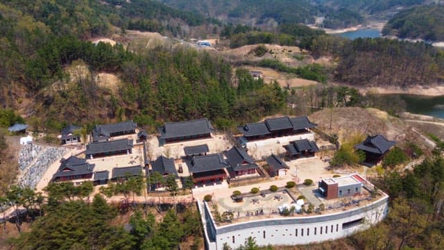 Traditional Korean village surrounded by forest