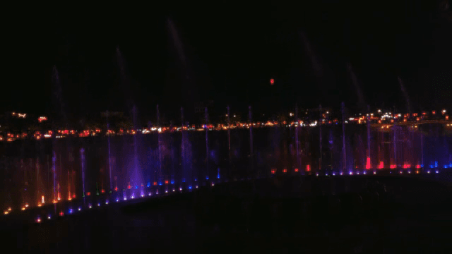 Colorful fountain show at night