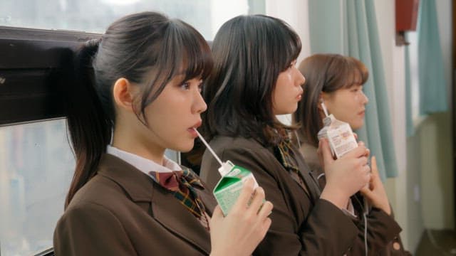 Students taking a break and drinking milk in the classroom