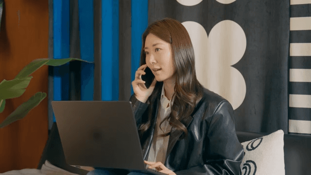 Woman talking on the phone indoors