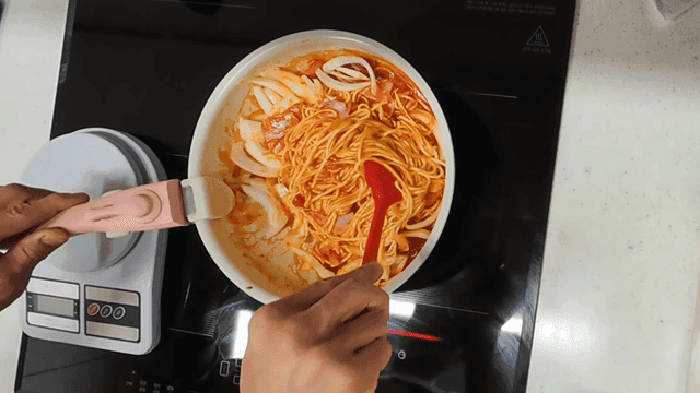 Tomato pasta cooked on induction cooktop
