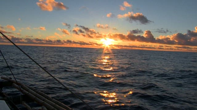 Sunset Over The Ocean Horizon