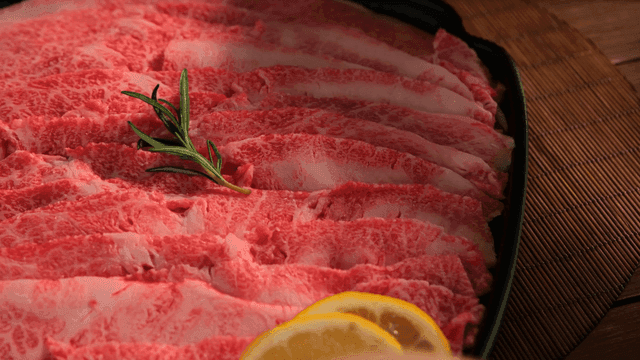 Freshly sliced beef with rosemary and lemon