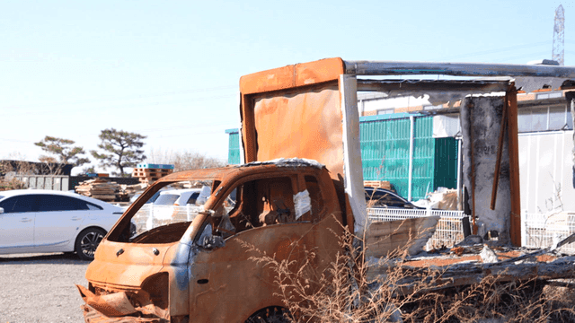 Rusty car in junkyard