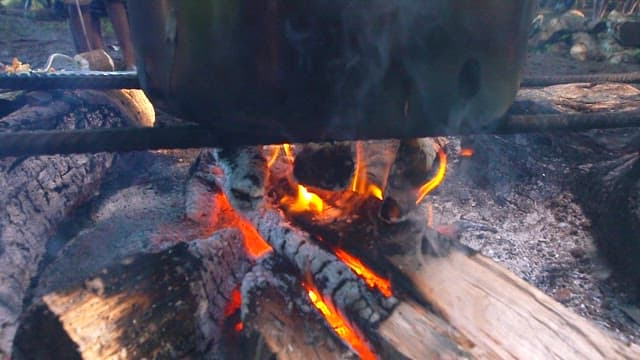 Fried chicken being cooked in hot oil