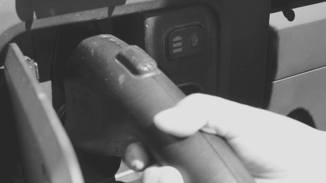 Electric car charging with a plugged-in cable