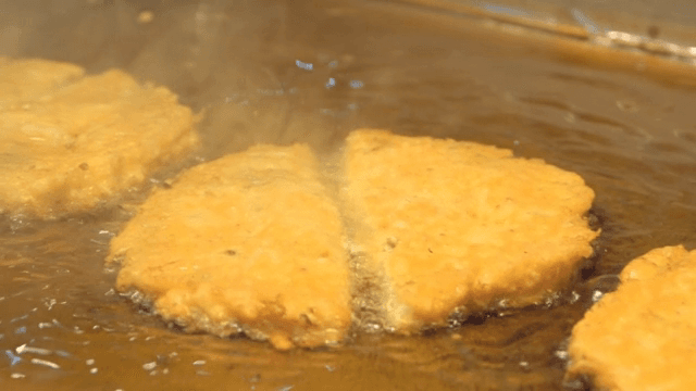 Korean pancakes frying in hot oil