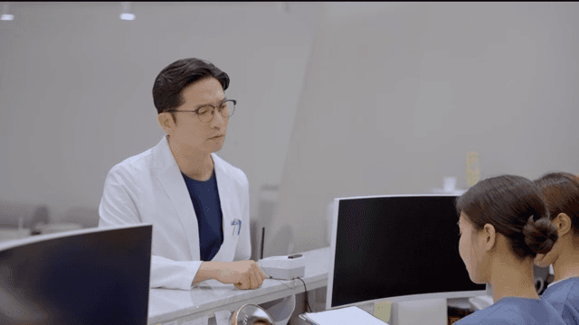 Doctor scolding hospital reception desk nurses