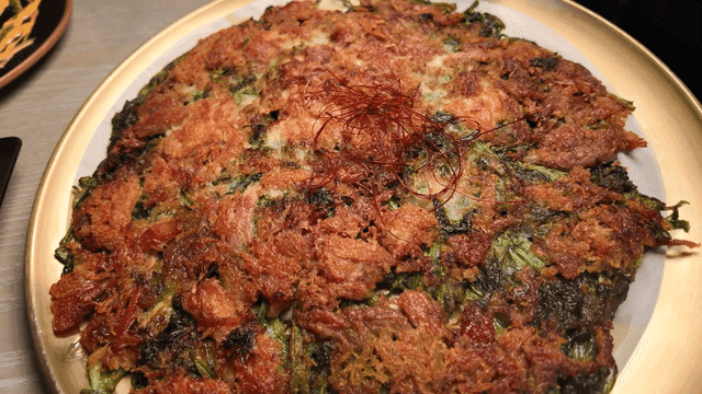 Crispy chicken pancake with water parsley