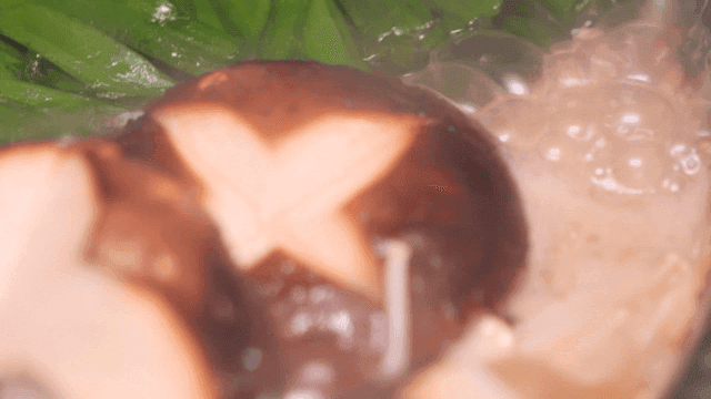 Vegetable and mushroom stew boiling in pot