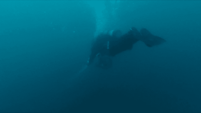 Diver exploring deep sea