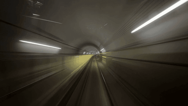 Subway tunnel with tracks and lights