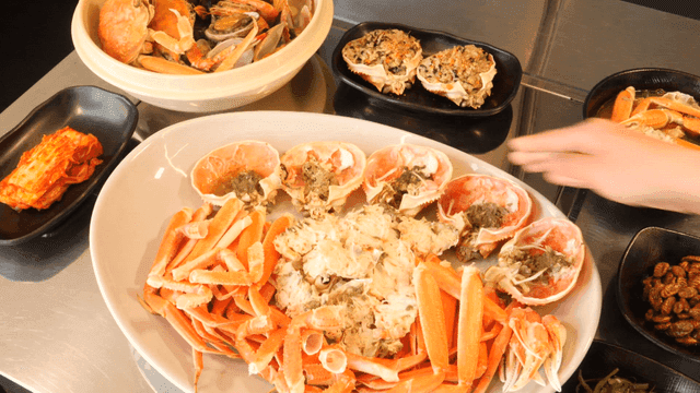 Various Korean Seafood Crab Dishes on Table