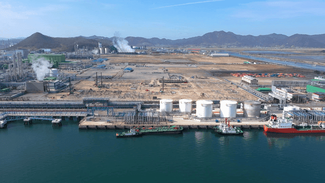 Industrial complex with ships docked