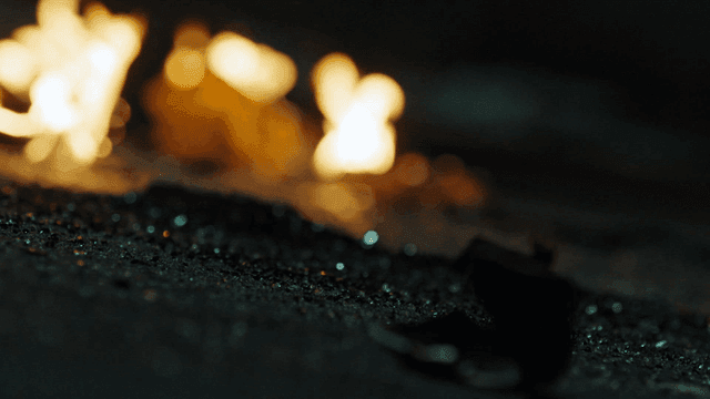 Burning paper with flames in the dark