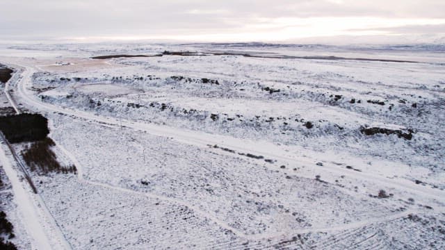 Car driving on a snowy road