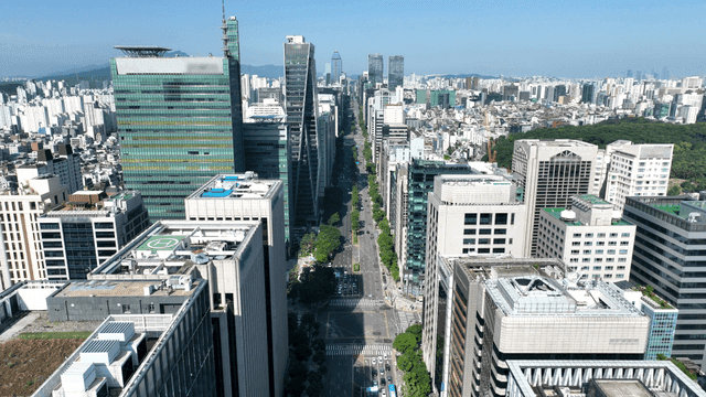 A bustling city street with skyscrapers