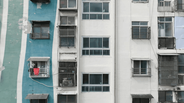 Old apartment buildings with peeling paint