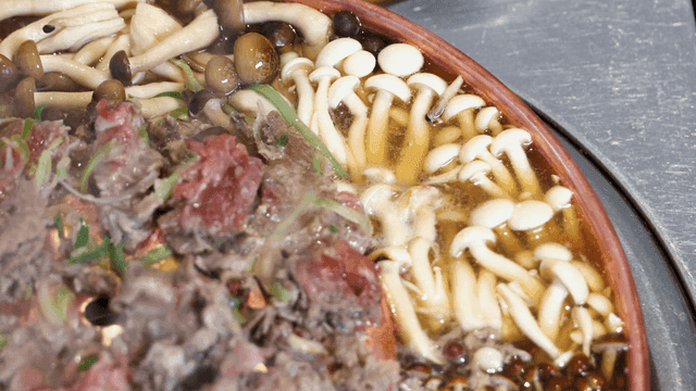 Hot pot with mushrooms and beef