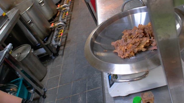 Preparing meat for cooking in the kitchen