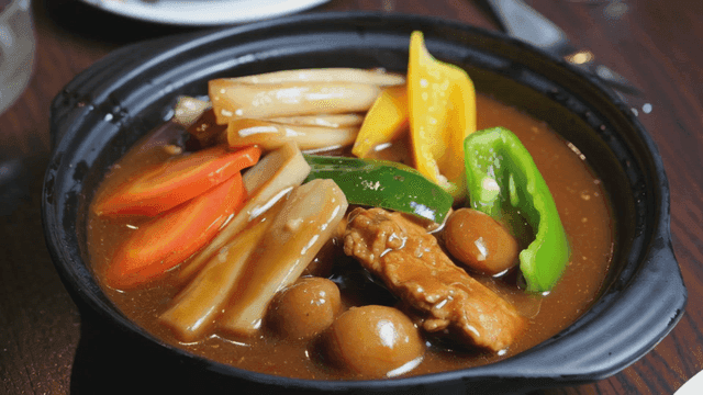 Rich Chinese soup with vegetables