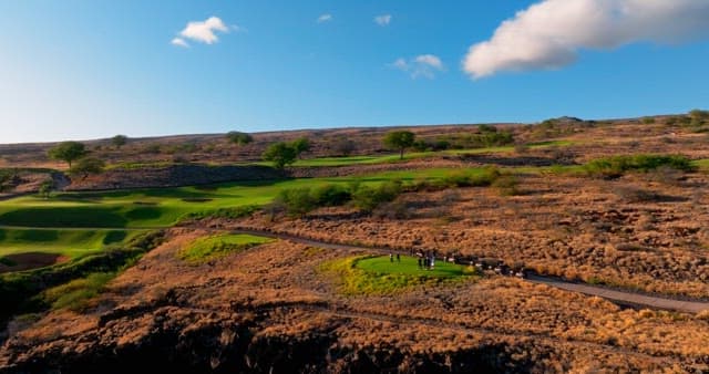 Aerial View of People Playing Golf in Nature