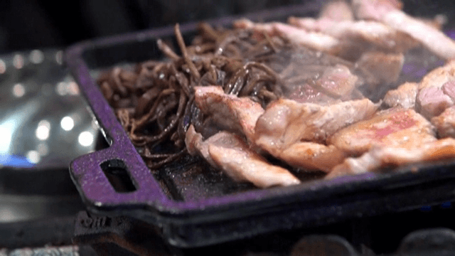 Grilled pork belly and bracken on a pan