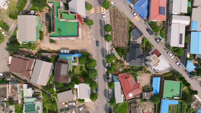 Aerial view of a village with farmlands