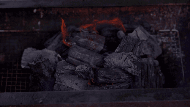 Charcoal burning in a grill