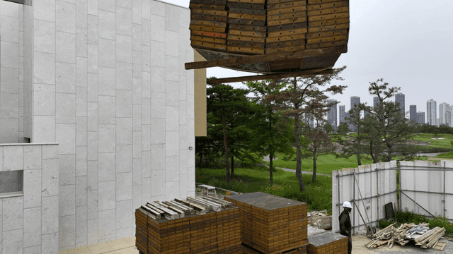 Construction site with a crane lifting materials