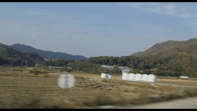 Rural landscape with fields and mountains