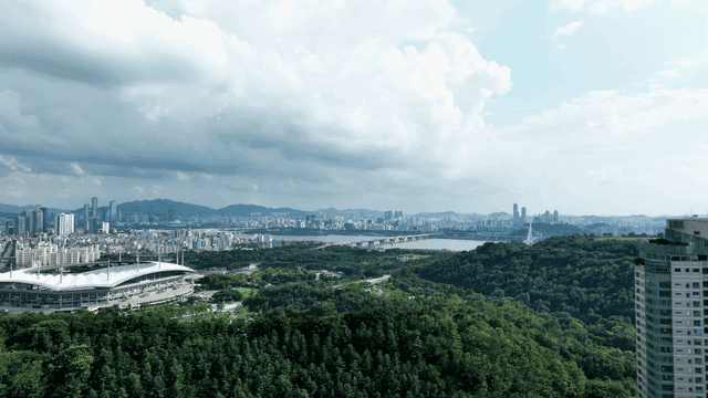Cityscape with stadium and river