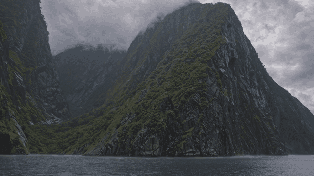 Majestic mountains with misty clouds
