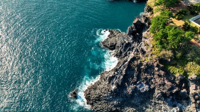 Rocky coastline with clear blue sea