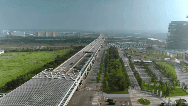 Aerial view of highway and surrounding landscape