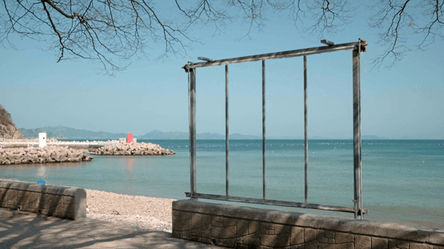 Quiet beach under cool shade