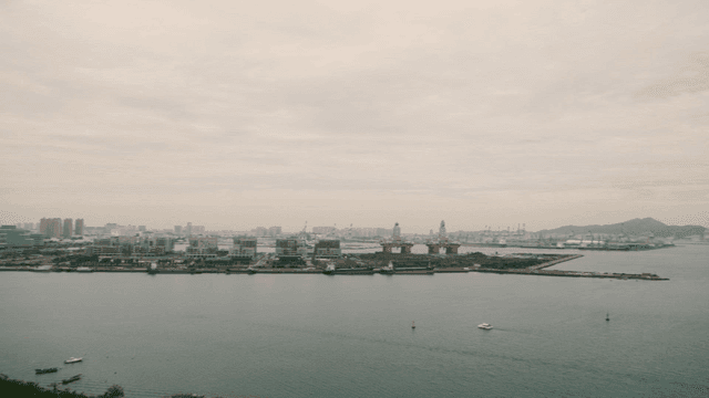 Vast city landscape overlooking a harbor
