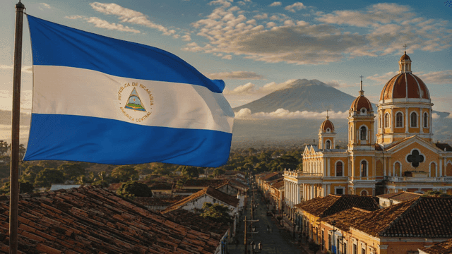Nicaraguan flag fluttering over landscape