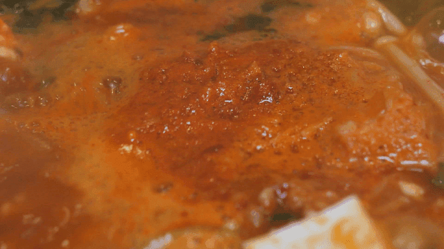 Kimchi stew boiling with tofu