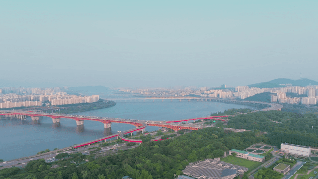 Seoul cityscape with Han River and grand bridge