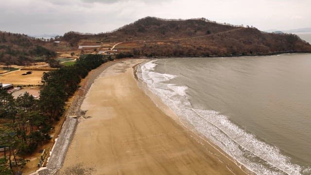 Quiet beach with gentle waves