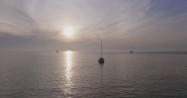 Serene sea with a yacht