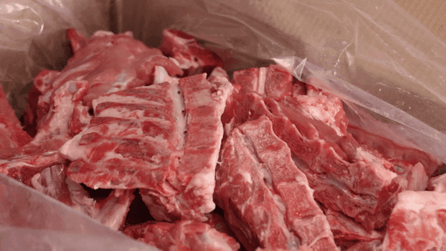 Raw pork pieces inside box