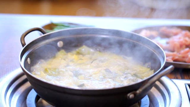 Ramen prepared in front of shabu-shabu boiling in a pot