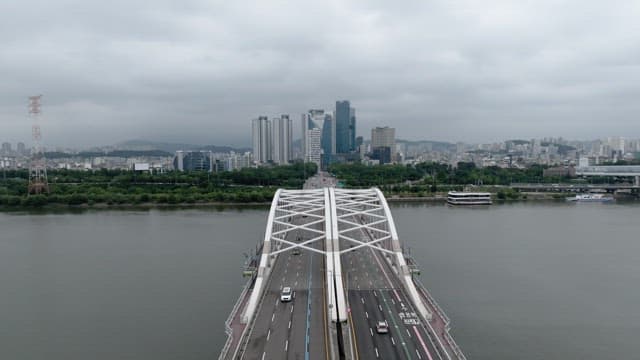 Overcast Cityscape with Bridge and Hangang River